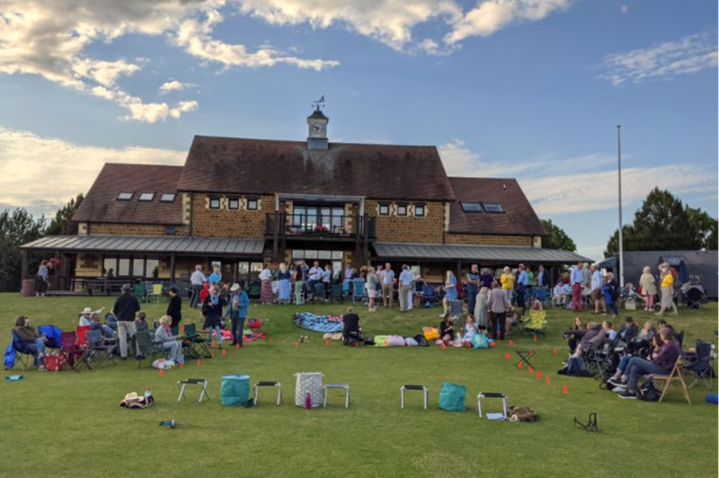 Crowd and clubhouse